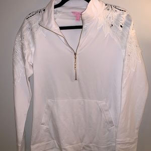 White popover with lace arm detail